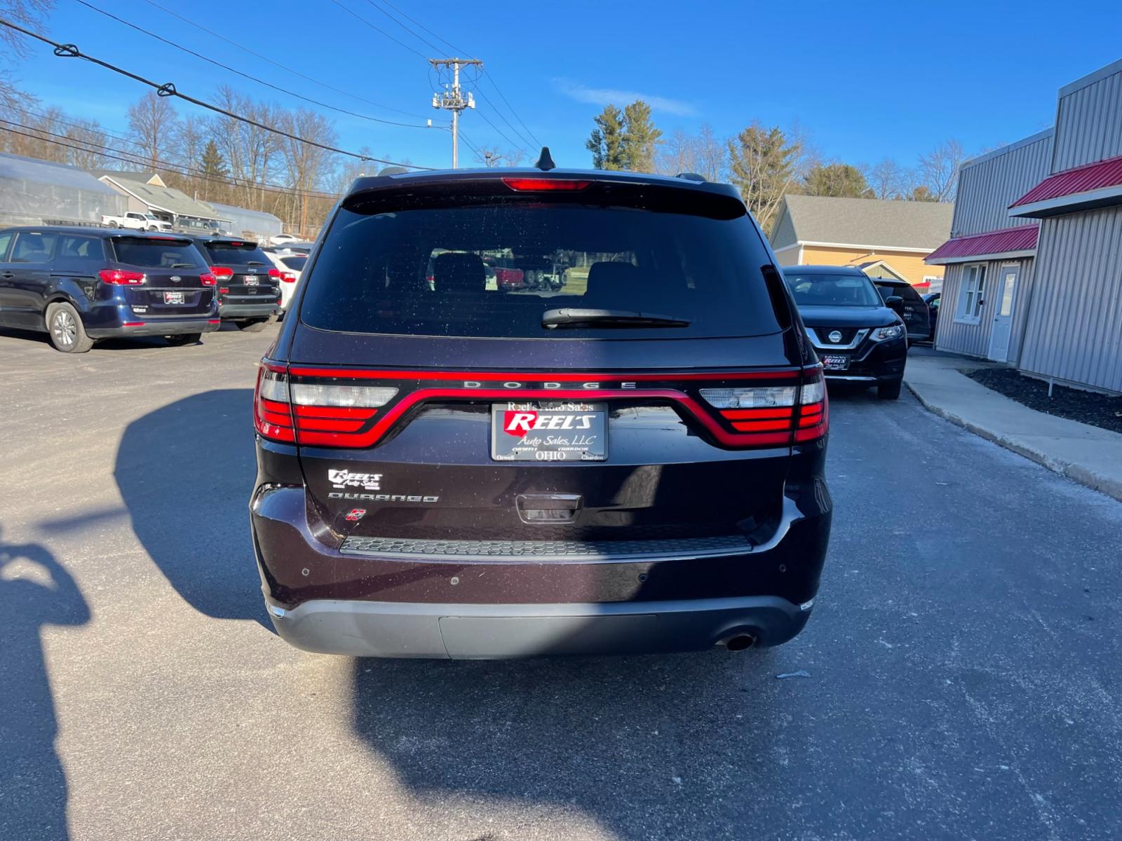 2018 Purple /Black Dodge Durango SXT Plus AWD (1C4RDJAG4JC) with an 3.6L V6 DOHC 24V engine, 8A transmission, located at 547 E. Main St., Orwell, OH, 44076, (440) 437-5893, 41.535435, -80.847855 - This 2018 Dodge Durango SXT Plus AWD is equipped with a powerful 3.6 Pentastar V6 engine paired with an 8-speed automatic transmission, offering a blend of performance and efficiency. This model features a comfortable interior with a power driver's seat, heated front seats, and a heated steering whe - Photo #8